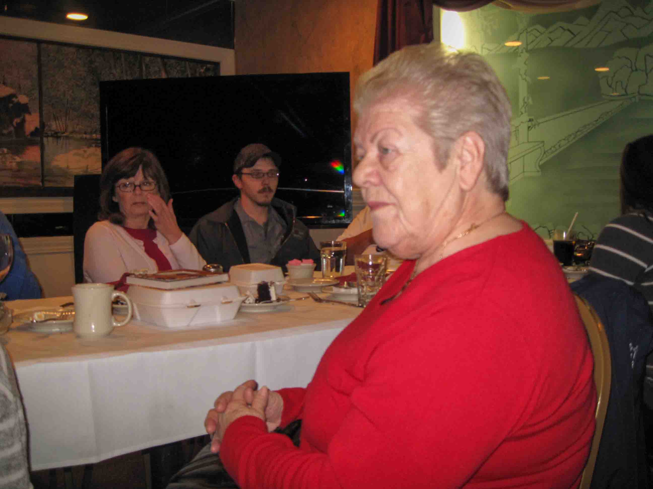 Celebrating the 50th Wedding Anniversary of Shirley & Joel Sexton.  Shirley in foreground, Tammy Sexton, Mark Sexton
Location:  TAT Restaurant, Columbus OH
Date:  29 Mar 2014
Source:  Julane Crabtree